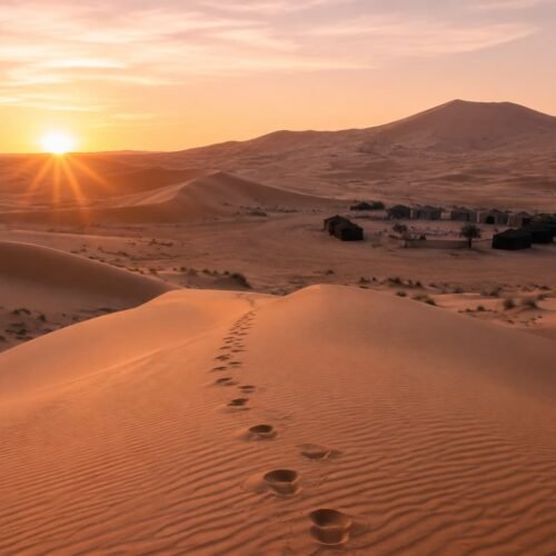Sunrise over the Erg Chebbi dunes near a Sahara desert camp, Merzouga