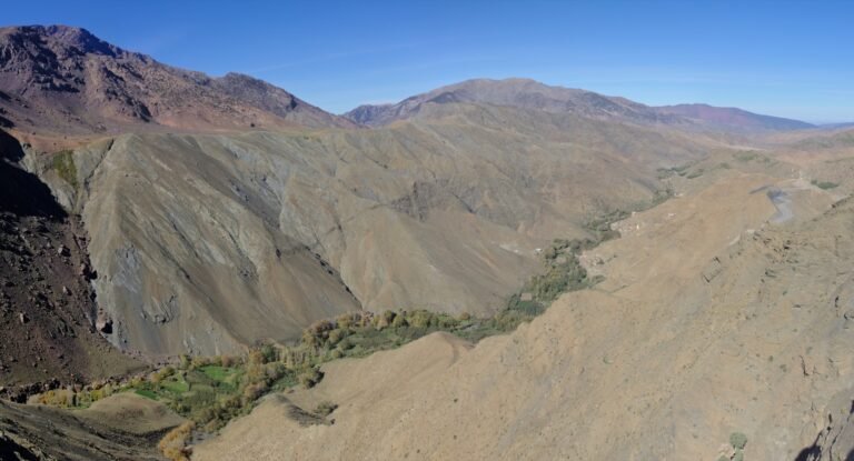 The paved switchback road of the Tizi n'Tichka pass climbing through the High Atlas Mountains, the main route between Marrakech and Ouarzazate on a Morocco road trip