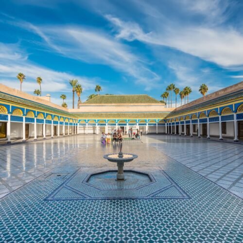 The grand tiled courtyard of Bahia Palace in Marrakech, one of the ticketed monuments factored into a Morocco travel budget