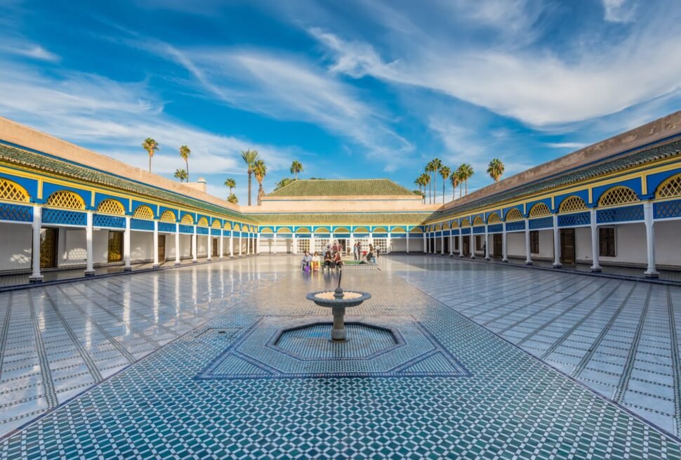 The grand tiled courtyard of Bahia Palace in Marrakech, one of the ticketed monuments factored into a Morocco travel budget