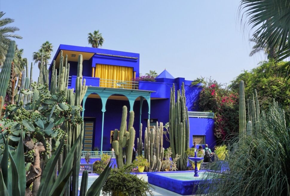 The cobalt-blue Villa Majorelle and cactus garden paths at Jardin Majorelle in Marrakech, a compact, shaded, stroller-friendly stop for families